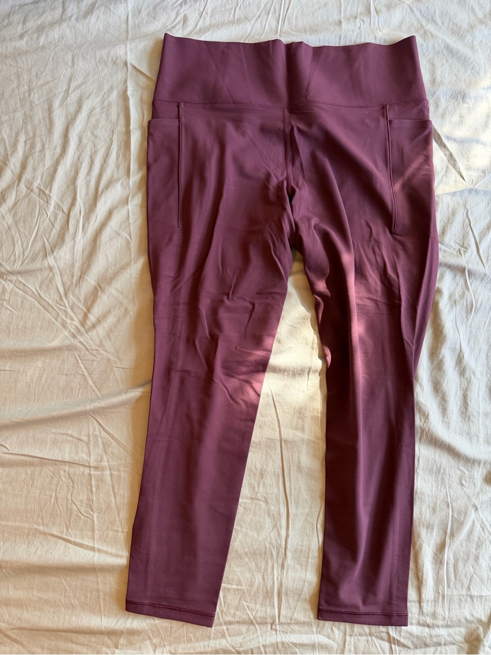 Athleta Salutation Stash Pocket Tight in Burgundy